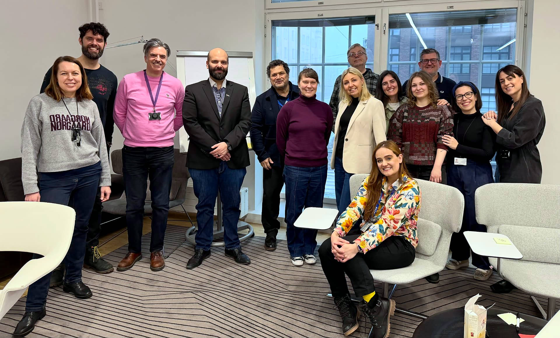 The ECHA communications team and #inextremis facilitators together in a bright meeting room after two days of branding workshops